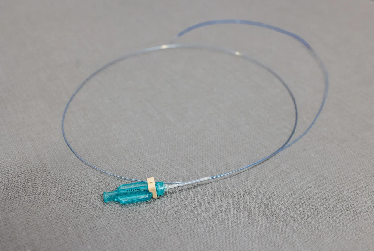 A catheter used to repair damaged or weakened vessels